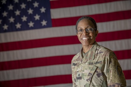 Master Sgt. Melissa Branch, the Alaska Army National Guard state religious affairs noncommissioned officer, poses for a photo at the Alaska National Guard Armory on Joint Base Elmendorf-Richardson, Alaska, Aug. 26, 2021. Branch, who was serving in the Marine Corps at the time when 9/11 happened, was stationed at the Navy Annex building next to the Pentagon in Washington and was there when the American Airlines Flight 77 struck the Pentagon during the terrorist attack that sparked a 20-year-long war. 